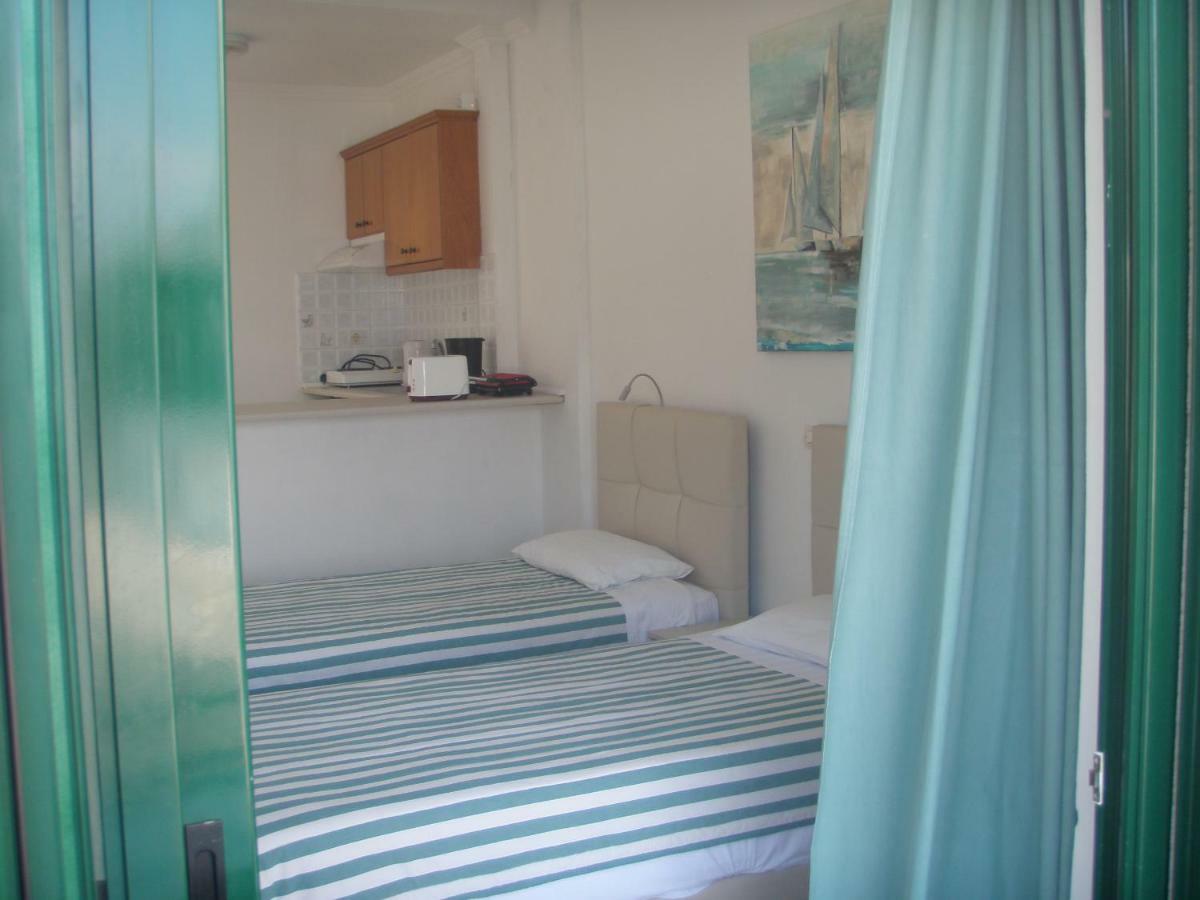 Umbrella Beach Apartments Kávos Exteriör bild